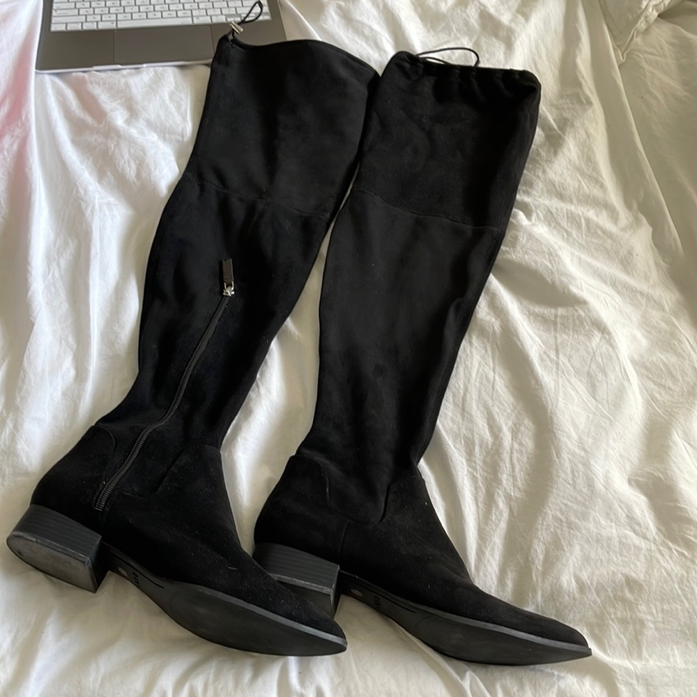 Tall black boots